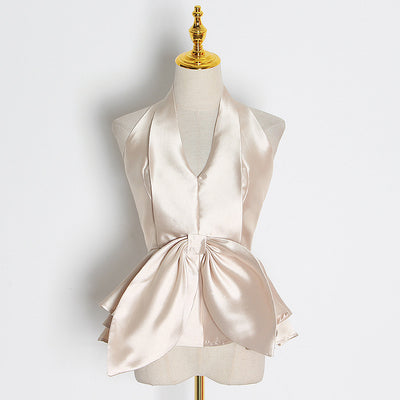 Blusa sin mangas con lazo grande - Image 10