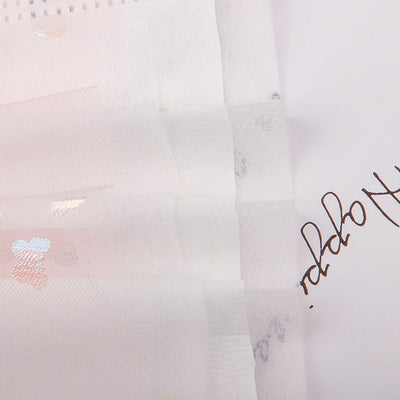 Light blue disposable face mask with iridescent butterfly patterns and white ear loops for dust protection. - Image 14