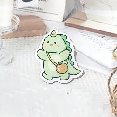 Cute green cartoon dinosaur acrylic badge brooch with a shy expression and small spikes on its back. - Image 20