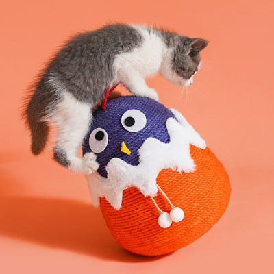 Purple and orange cotton rope cat toy shaped like a chick hatching from an egg with white faux fur trim. - Image 4