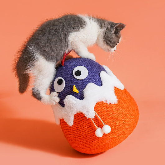 Purple and orange cotton rope cat toy shaped like a chick hatching from an egg with white faux fur trim. - Image 4