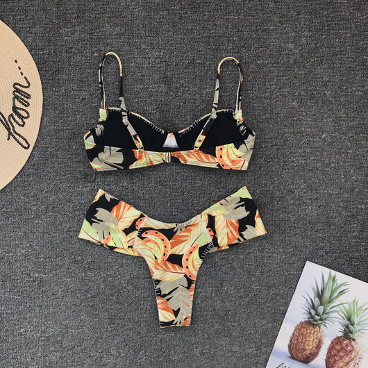 Tropical leaf print bikini with underwire gathered top and high-waisted bottoms in orange, yellow, and black. - Image 3