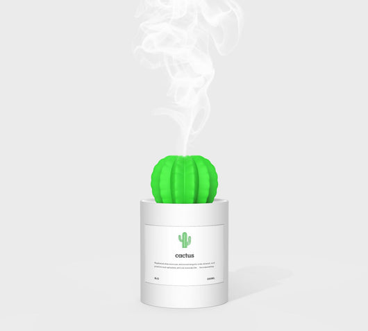 Person holding a glowing white cactus humidifier with a green top; inset shows five white humidifier filter sticks. - Image 2