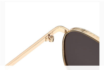 Gold frame square-oval sunglasses with gradient black and grey lenses and black temple tips on a white background. - Image 19