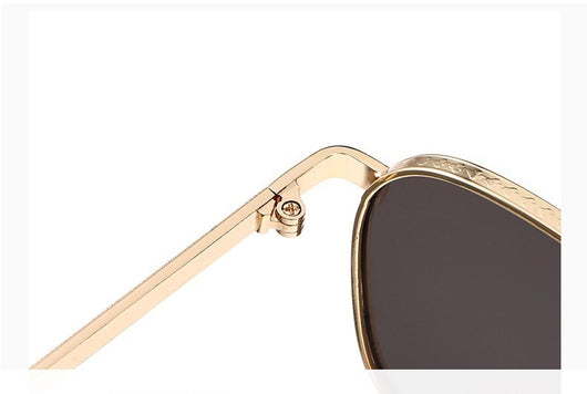 Gold frame square-oval sunglasses with gradient black and grey lenses and black temple tips on a white background. - Image 19