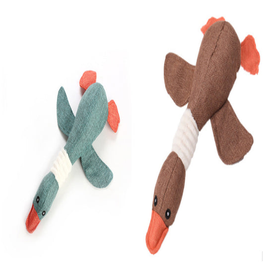 Plush teal duck dog toy with orange beak and feet, and a white ribbed neck, designed for sounding and puzzling. - Image 49