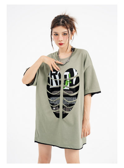 Camiseta Suelta con Detalles Rasgados y Costuras Decorativas - Image 10