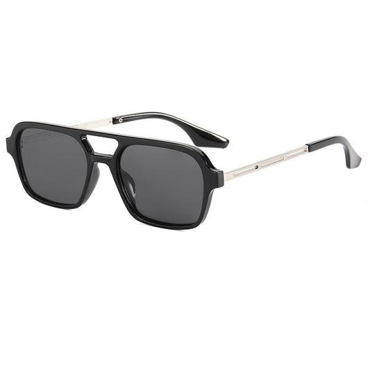 Retro black frame sunglasses with pink square lenses and a double bridge, featuring silver-colored temple accents.