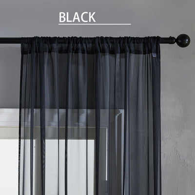 Sheer pink rod pocket curtain hanging on a black curtain rod, offering light transmission for a modern room. - Image 3