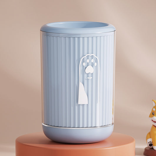Light blue pet foot washing cup with a white paw print design, ribbed texture, and smooth base. - Image 18