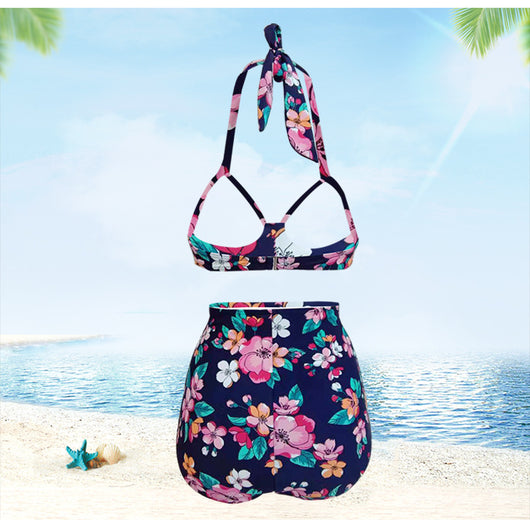 Navy blue floral high-waisted bikini with a halter top and front tie knot, featuring pink, orange, and white flowers. - Image 15