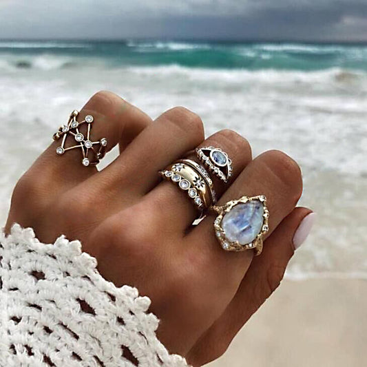 Set de 4 Anillos de Moda Personalidad Ojo del Diablo Estrella Gota de Agua Dorado