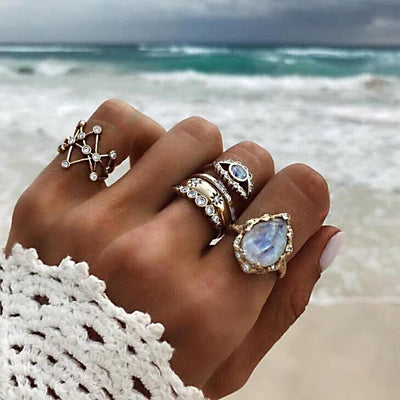 Set de 4 Anillos de Moda Personalidad Ojo del Diablo Estrella Gota de Agua Dorado