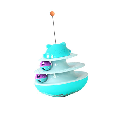 A playful kitten stands on its hind legs, batting at a dangling toy attached to a green and white multi-level cat track toy with rolling balls. - Image 13