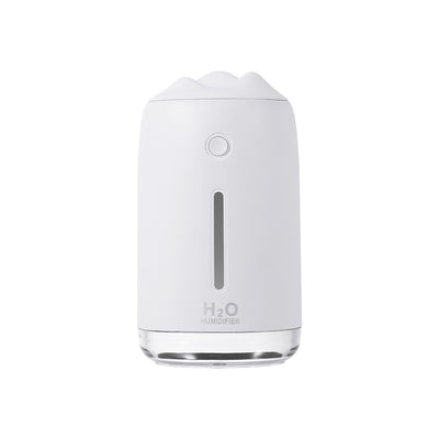 Dark night green mini humidifier with a white mountain-shaped top, clear base, and visible water level indicator. - Image 3
