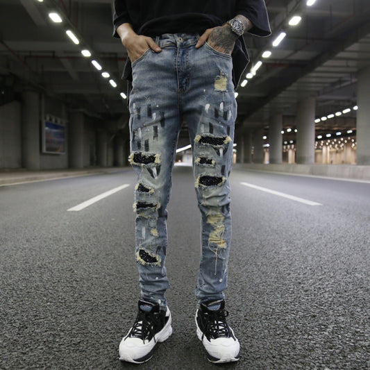 Jeans Slim Fit Azul con Parches de Lentejuelas y Detalles Rotos
