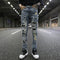 Jeans Slim Fit Azul con Parches de Lentejuelas y Detalles Rotos