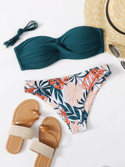 Blue bandeau bikini top with tropical leaf print high-cut bottom, styled with sandals, sunglasses, and a straw hat. - Image 15