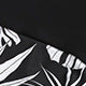 Women's black and white tropical leaf print short sleeve rash guard top with a quarter-zip, paired with solid black swim shorts featuring matching printed cuffs - Image 12