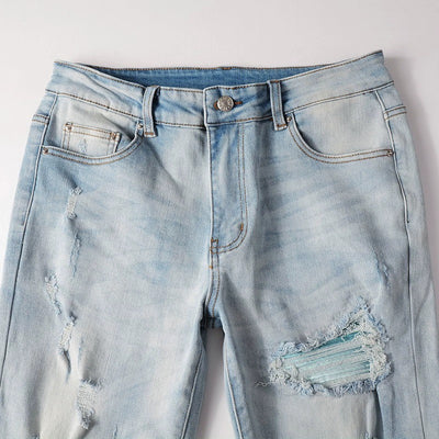 Jeans Azul Cielo Desgastado con Roturas Vintage para Hombre - Image 27