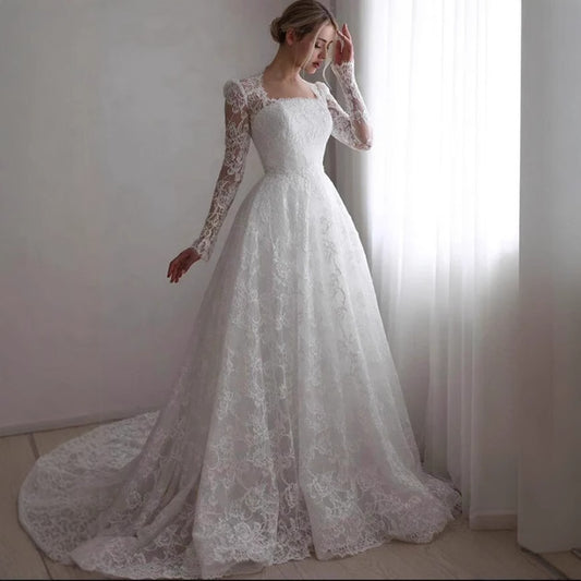 Vestido de Novia Largo con Mangas Bordadas y Cola