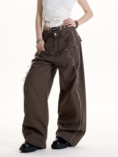 Jeans Vintage Americano con Diseño Deconstruido y Detalles de Borla - Image 6