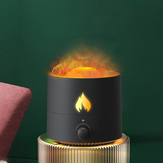 White cylindrical night light and ultrasonic humidifier with an orange flame effect light and a control knob. - Image 5