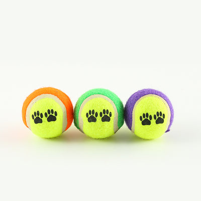 Pink pet throwing cue with a yellow and orange tennis ball, designed for outdoor dog training and play. - Image 12
