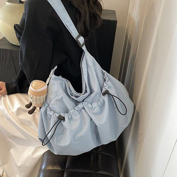 Bolsa Escolar Cruzada de Tela Ultraligera Plisada