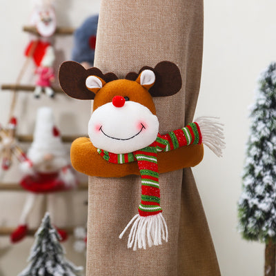Plush Santa Claus curtain tie-back with a red and grey knitted hat, white beard, and red body, holding a golden curtain. - Image 5