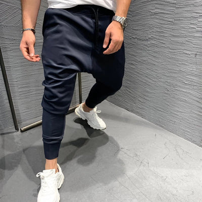 Pantalones deportivos elásticos para hombre - Image 11
