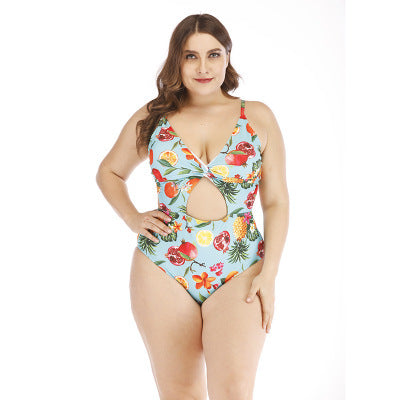 Plus size light blue one-piece swimsuit with tropical fruit and floral print, V-neck, and midriff cutout. - Image 3