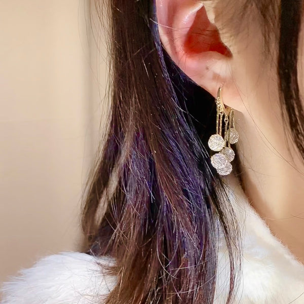 Aretes de Lujo Minimalista con Borlas en Tono Durazno