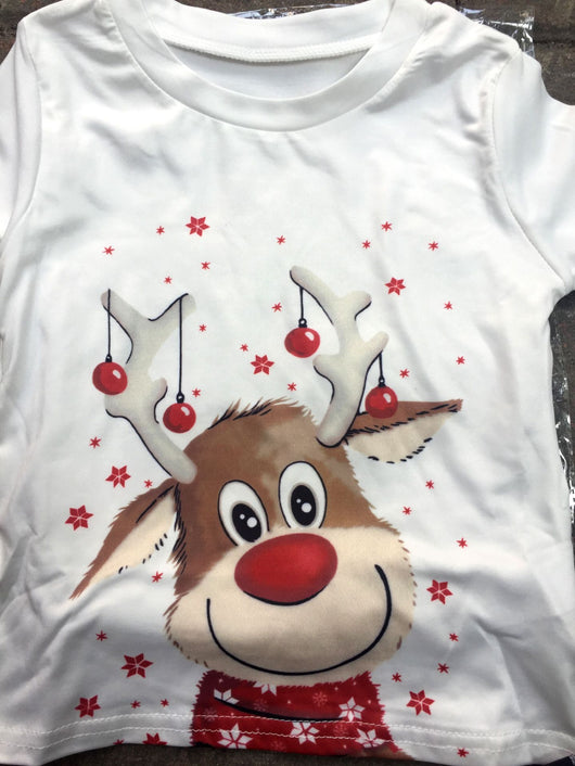 Family of four and a golden retriever wearing matching white long-sleeve reindeer tops and red plaid pajama pants. - Image 20
