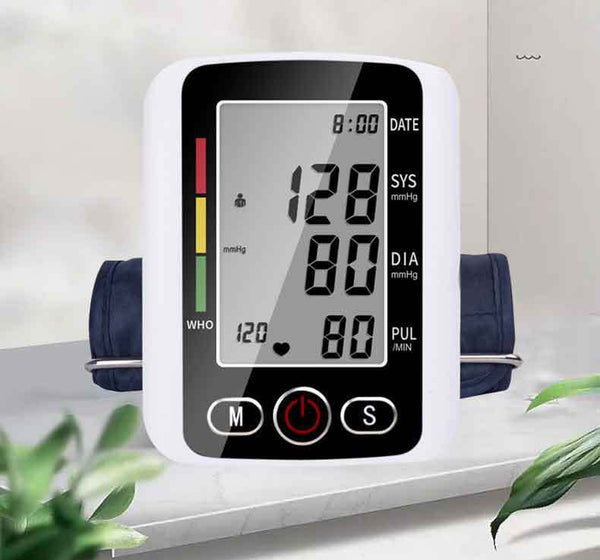 White electronic arm blood pressure monitor with large digital display and dark blue cuff, next to its product box.
