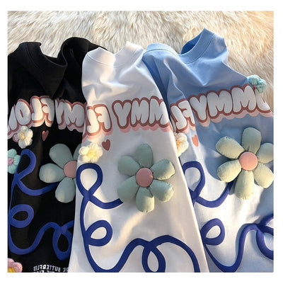 Playera Estampada con Letras Florales y Espuma - Image 21