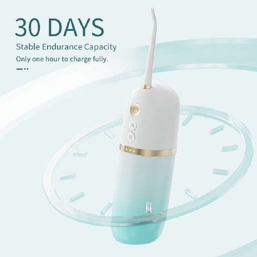 White and rose gold portable electric water flosser with a curved nozzle and volume markings for 160ml and 200ml. - Image 5