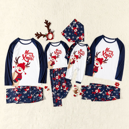 Matching family Christmas pajamas with white and navy blue long-sleeve tops, reindeer print, and "Merry Xmas!" text.