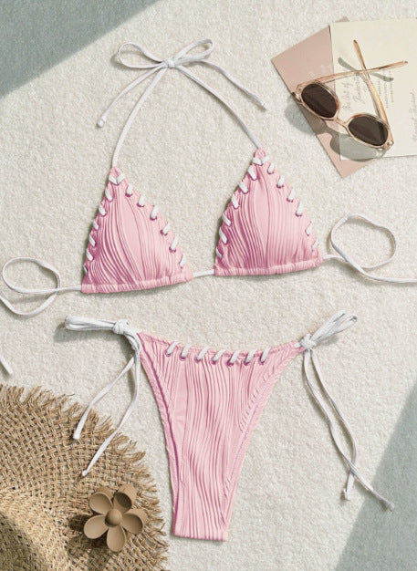 Light blue ribbed bikini swimsuit with pink tie straps and lacing detail, featuring a triangle top and thong bottom. - Image 7