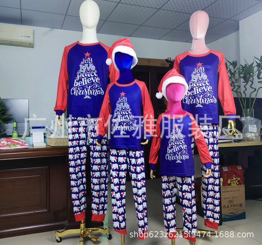 Family matching Christmas pajamas with blue long-sleeve tops, red raglan sleeves, and a Christmas tree graphic. Blue pants feature a white polar bear pattern. - Image 7