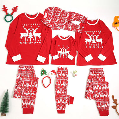 Red long-sleeve Christmas pajama set with white reindeer and Christmas tree patterns, featuring a crew neck top and patterned pants. - Image 9