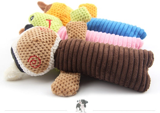 Yellow and blue plush dog toy with ribbed body, alongside a blue dog raincoat with hood and reflective strips. - Image 14