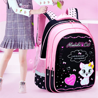 Kids black and pink backpack with a cute white cat print, paired with a matching lunch bag.