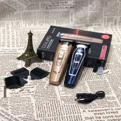 Dark blue electric hair clipper with silver accents and black buttons, featuring a stainless steel blade. - Image 3
