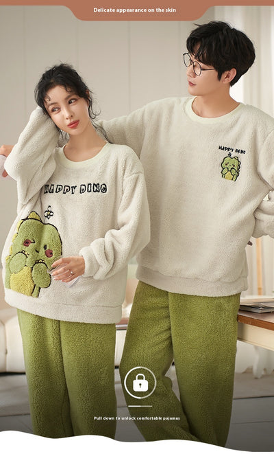 Couple wearing matching cream coral fleece pajamas with gray pants and bear embroidery, seated on a bed. - Image 21