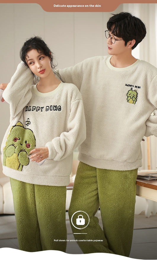 Couple wearing matching cream coral fleece pajamas with gray pants and bear embroidery, seated on a bed. - Image 21