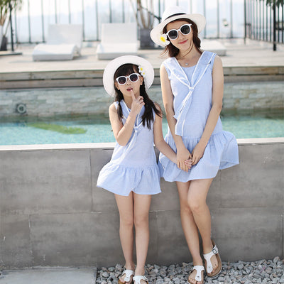 Kids in matching Korean-style summer outfits: boy in white polo and blue gingham shorts, girl in blue gingham dress. - Image 6
