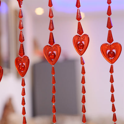 Close-up of a red heart-shaped bead curtain with multiple acrylic strands, ideal for doorway or room decoration. - Image 13
