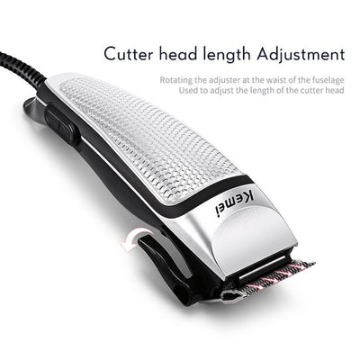 Kemei electric hair clipper kit with silver and black trimmer, four guide combs, scissors, comb, and cleaning brush. - Image 5