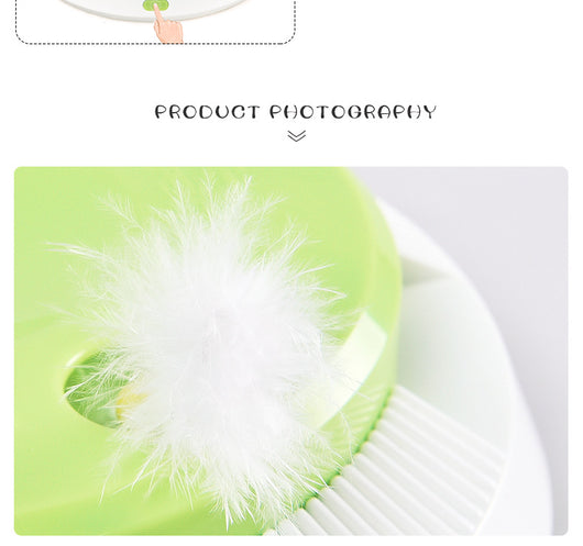 Round electric cat toy with a white base and a lime green top, featuring a rotating white feather. - Image 6